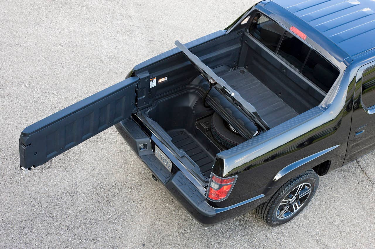 2012 Honda Ridgeline Sport pickup bed with in-bed trunk.