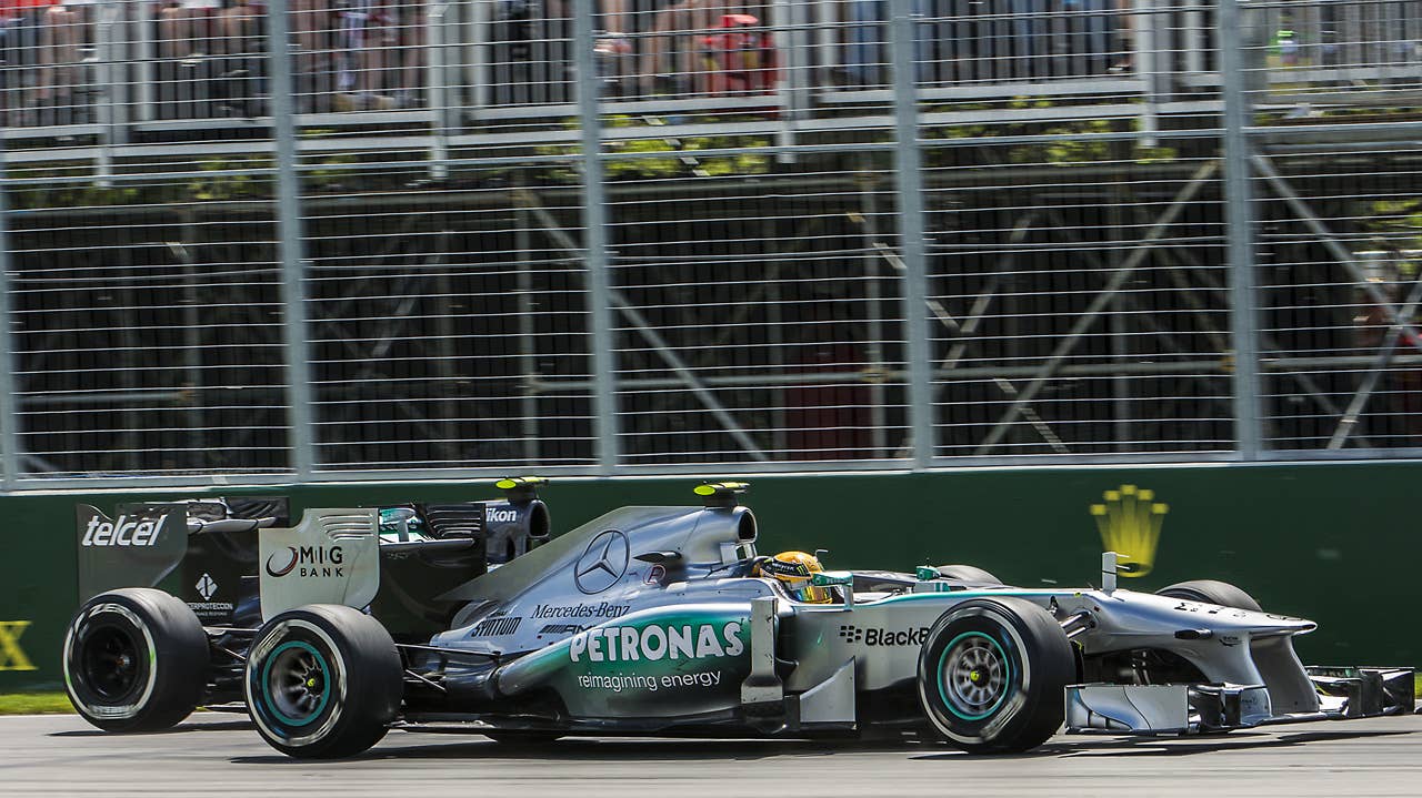 Mercedes F1 driver Nico Rosberg of Germany overtakes Sauber's Esteban Gutierrez of Mexico in the hairpin corner at the Circuit Gilles Villeneuve in Montreal on June 9, 2013 during the Canadian Formula One Grand Prix.    AFP PHOTO / ROGERIO BARBOSAROGERIO BARBOSA/AFP/Getty Images