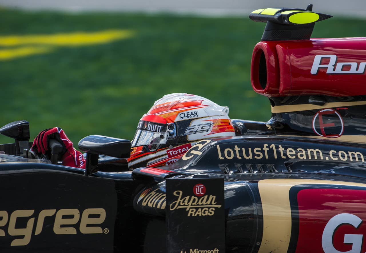 Lotus driver Romain Grosjean of France takes the hairpin corner at the Circuit Gilles Villeneuve in Montreal on June 9, 2013 during the Canadian Formula One Grand Prix.    AFP PHOTO / ROGERIO BARBOSAROGERIO BARBOSA/AFP/Getty Images