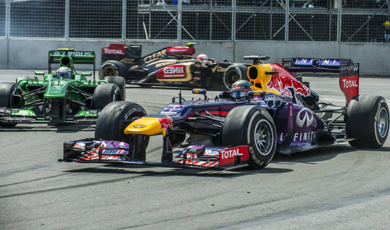 Red Bull Sebastian Vettel of Germany leading the race at the hairpin corner, during the F1 Grand Prix race at the Circuit Gilles Villeneuve in Montreal on June 9, 2013 during the Canadian Formula One Grand Prix.    AFP PHOTO / ROGERIO BARBOSAROGERIO BARBOSA/AFP/Getty Images