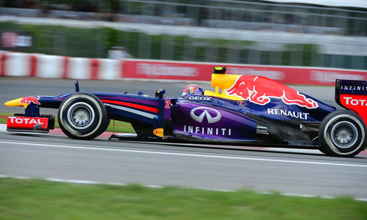 Red Bull driver Mark Webber of Australia powers his car to fourth place in the Canadian Formula One Grand Prix at the Circuit Gilles Villeneuve in Montreal on June 9, 2013.    AFP PHOTO/Emmanuel DunandEMMANUEL DUNAND/AFP/Getty Images