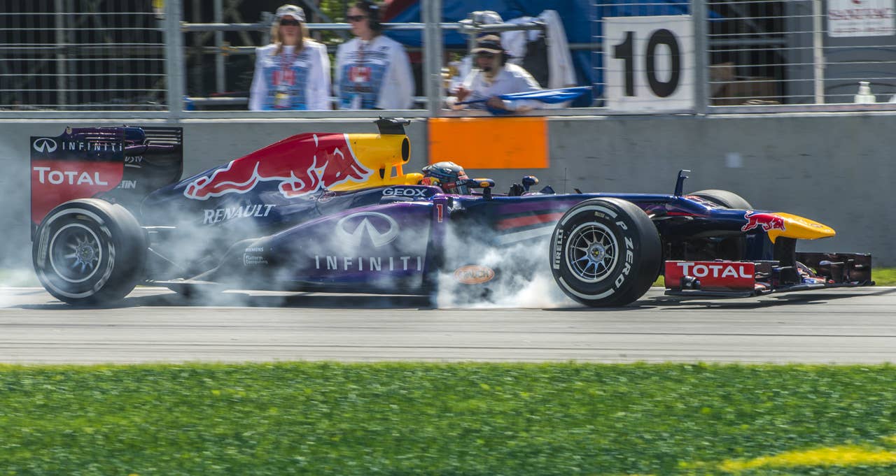 Red Bull driver Sebastian Vettel of Germany pushes hard on the brakes at the hairpin corner at the Circuit Gilles Villeneuve in Montreal on June 9, 2013 during the Canadian Formula One Grand Prix.     AFP PHOTO / ROGERIO BARBOSAROGERIO BARBOSA/AFP/Getty Images