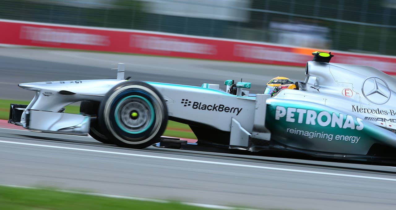 Mercedes driver Lewis Hamiton powers his car to third place in the Canadian Formula One Grand Prix at the Circuit Gilles Villeneuve in Montreal on June 9, 2013.  AFP PHOTO/Emmanuel DunandEMMANUEL DUNAND/AFP/Getty Images