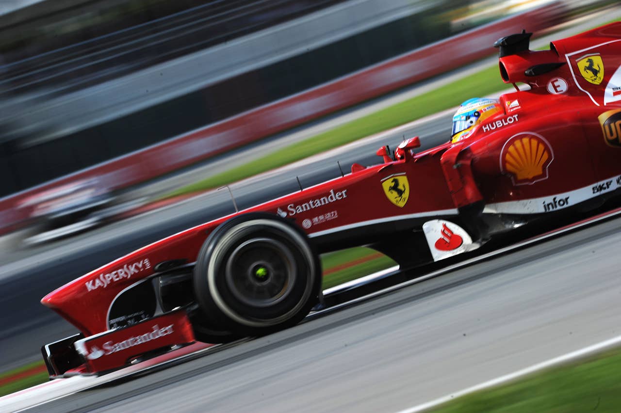 MONTREAL, QC - JUNE 09:  Fernando Alonso of Spain and Ferrari drives during the Canadian Formula One Grand Prix at the Circuit Gilles Villeneuve on June 9, 2013 in Montreal, Canada.  (Photo by Shaun Botterill/Getty Images)
