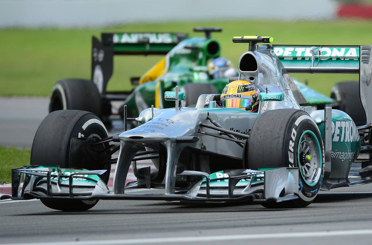 Mercedes driver Lewis Hamiton powers his car to third place in the Canadian Formula One Grand Prix at the Circuit Gilles Villeneuve in Montreal on June 9, 2013.    AFP PHOTO/Emmanuel DunandEMMANUEL DUNAND/AFP/Getty Images