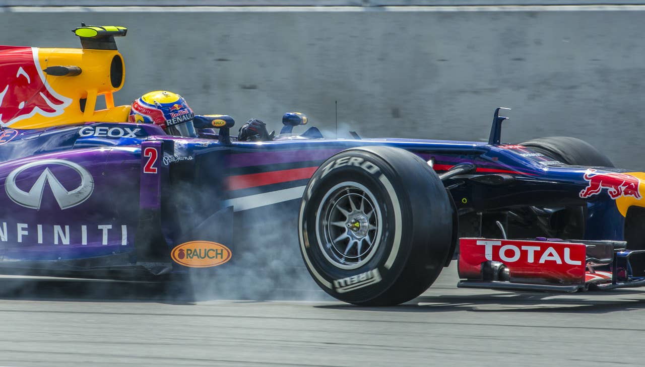 Red Bull Mark Webber of Australia passing the hairpin corner, during the F1 Grand Prix race at the Circuit Gilles Villeneuve in Montreal on June 9, 2013 during the Canadian Formula One Grand Prix.   AFP PHOTO / ROGERIO BARBOSAROGERIO BARBOSA/AFP/Getty Images