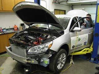 Removed from a car parked nearby, a state-of-the-art engine sits unused next to a desk in a dusty corner of a classroom.  Students at Wayne State University in Detroit have installed an older engine model, and are tinkering with it to make it more fuel efficient. Their challenge: Reinvent the guts of an ordinary car, the 2013 Chevy Malibu, and transform it into a poster child for green driving.  Wayne State is one of 15 universities across the country participating in the Department of Energy’s EcoCar2 competition to see which school can build a car that reduces fuel consumption, greenhouse gas emissions and tailpipe emissions.  Car-building competitions often favor exotic vehicles: Students design stealth-shaped vehicles and solar-paneled cars that are futuristic, yet unrealistic.  In the EcoCar2 challenge, students must use cars that are ready-made for today’s roads. And they must build a car that regular, Walmart-loving mainstream Americans might actually want to buy.  How it fits with President Obama's energy goals: