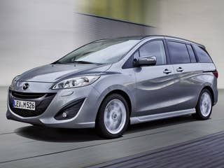 Sticker price: $19,940 to $24,470  Invoice: $17,511 to $19,822  Fuel economy: 21 city/28 highway  OK, we’re cheating here a bit. The Mazda5 is not officially considered a minivan, but it sure looks like one. Replete with sliding doors and three rows of seats, this might be a good options for moms who don’t mind a minivan but don’t like driving a bigger car.  The mini minivan, if you will, operates with a vertical lift in the back, rear-view backup cameras come standard on Touring and Grand Touring trim levels and six standard airbags for all three rows of seating. The car earned“Recommended” status from Consumer Reports, and is an affordable alternative to normal-sized minivans that cost twice as much.