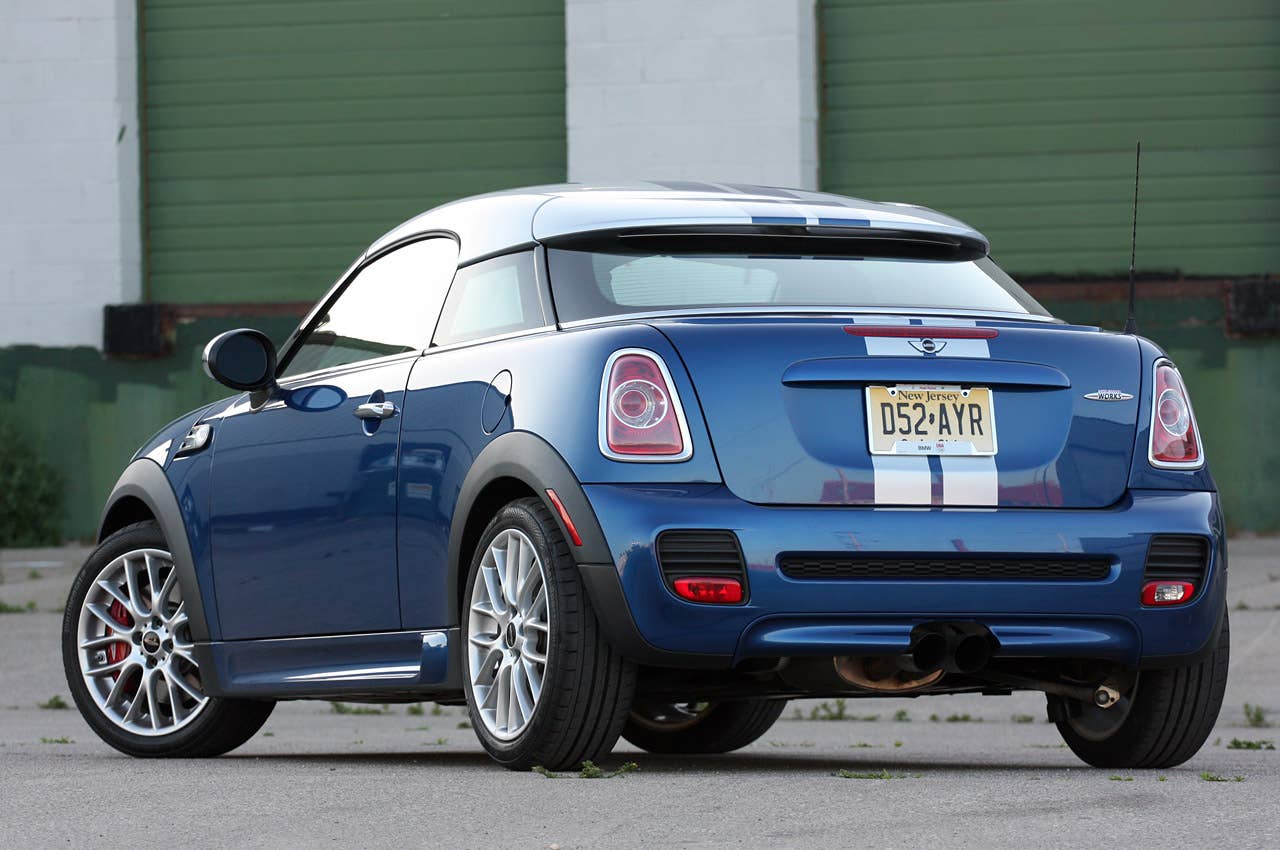 2012 Mini John Cooper Works Coupe rear 3/4 view