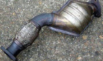 Since 1975 all vehicles sold in the U.S. have a catalytic converter, which helps strip out carbon monoxide and hydrocarbons. It does this by passing the toxic fumes through precious metals such as platinum, palladium or rhodium, metals that fetch a high price in scrap yards. It's so easy to lift a catalytic converter that thefts are epidemic in some cities.  How to Protect Your Vehicle?  Most states now have laws restricting scrap yards from buying catalytic converters with no questions asked. Thieves target cars that have been sitting for long periods of time in parking lots that aren't particularly busy. You can also engrave your license plate number on the converter or ask your local shop to reinforce the converter with additional brackets to make it more of a pain to rip from your undercarriage.