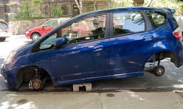 An old favorite, all anyone needs to steal wheels off of a car is a few cinderblocks and a some tools. Usually the entire wheel is stolen, and the tire and rims can be sold separately. Recently there has been a nationwide trend of Honda Fit wheels being stolen because the smaller rims are prized in car modification. In 2012, police discovered two men stealing Honda Fit wheels from a dealership. In that heist 72 wheels had been taken.  How To Protect Your Vehicle There are circular steel wheel locks which resemble the boots used by police departments on parking scofflaws. As well as preventing the car from being driven they also prevent the wheels from being stolen. They're a very visible deterrent to theft but may not be practical unless wheel theft is a major problem in your area.