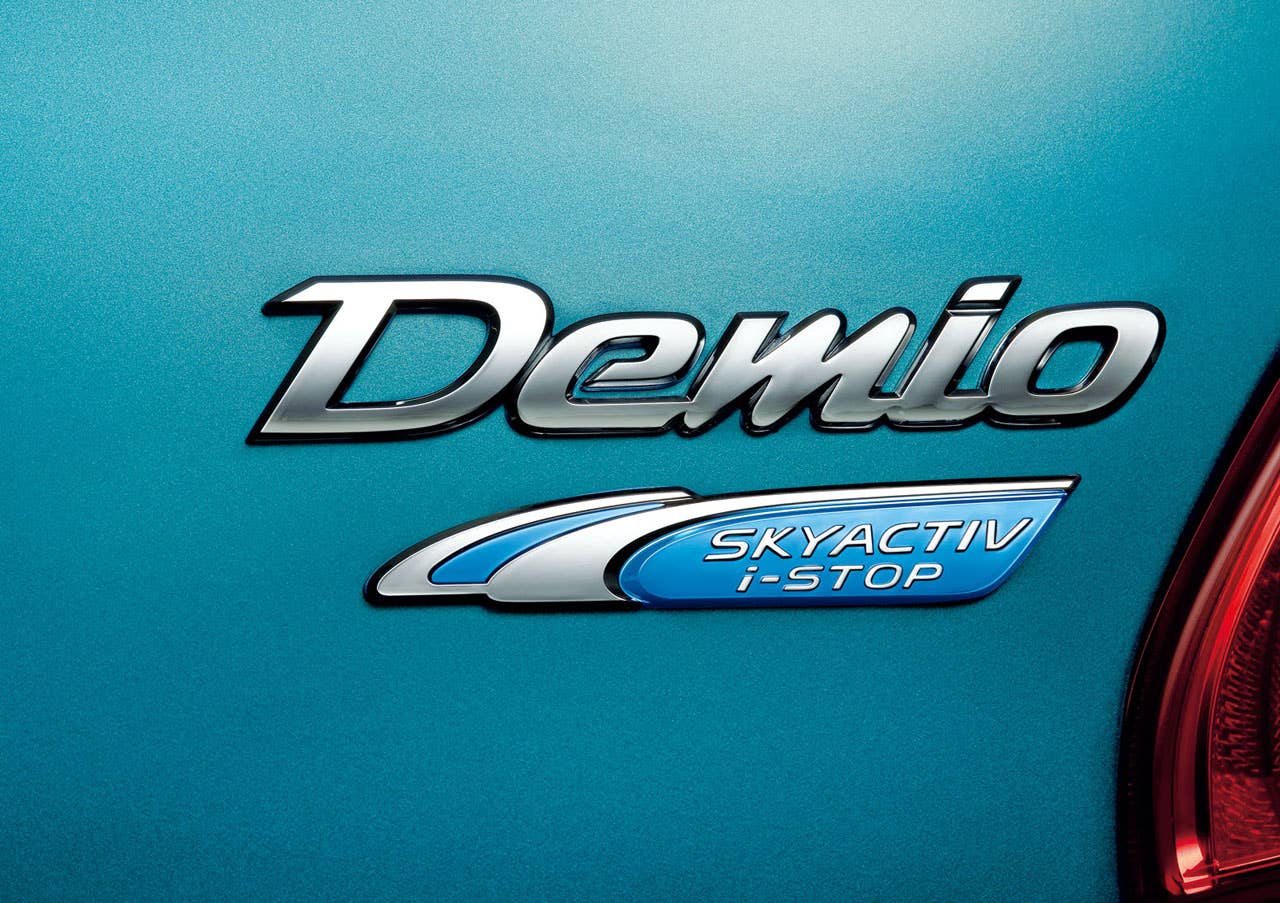Mazda Demio badge