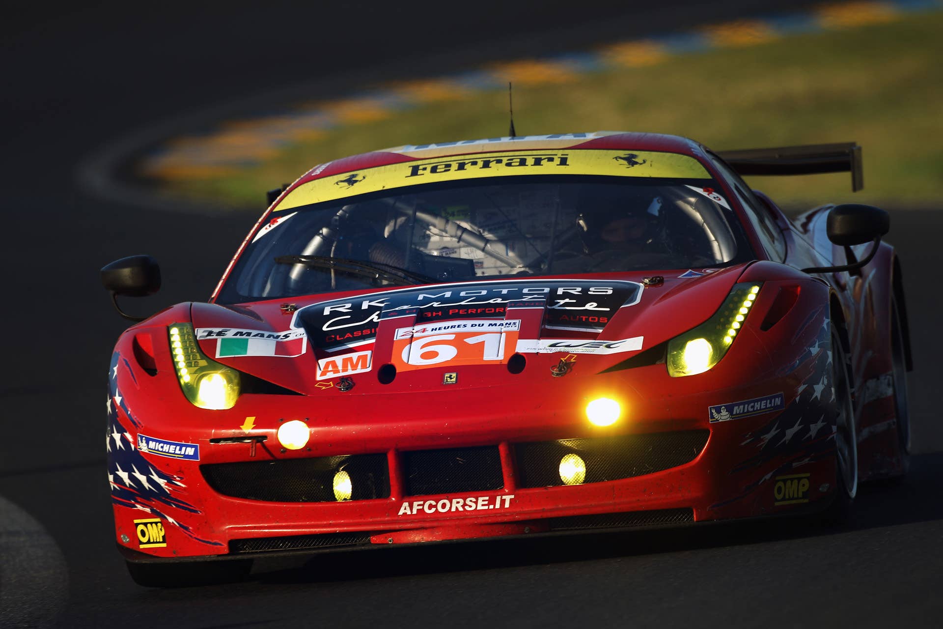 LE MANS, FRANCE - JUNE 17:  The AF - Corse Michael Waltrip Racing Ferrari 458 of Robert Kauffman, Rui Aguas and Brian Vickers in action during Le Mans 24 Hour race at the Circuit de la Sarthe on June 17, 2012 in Le Mans, France.  (Photo by Bryn Lennon/Getty Images)