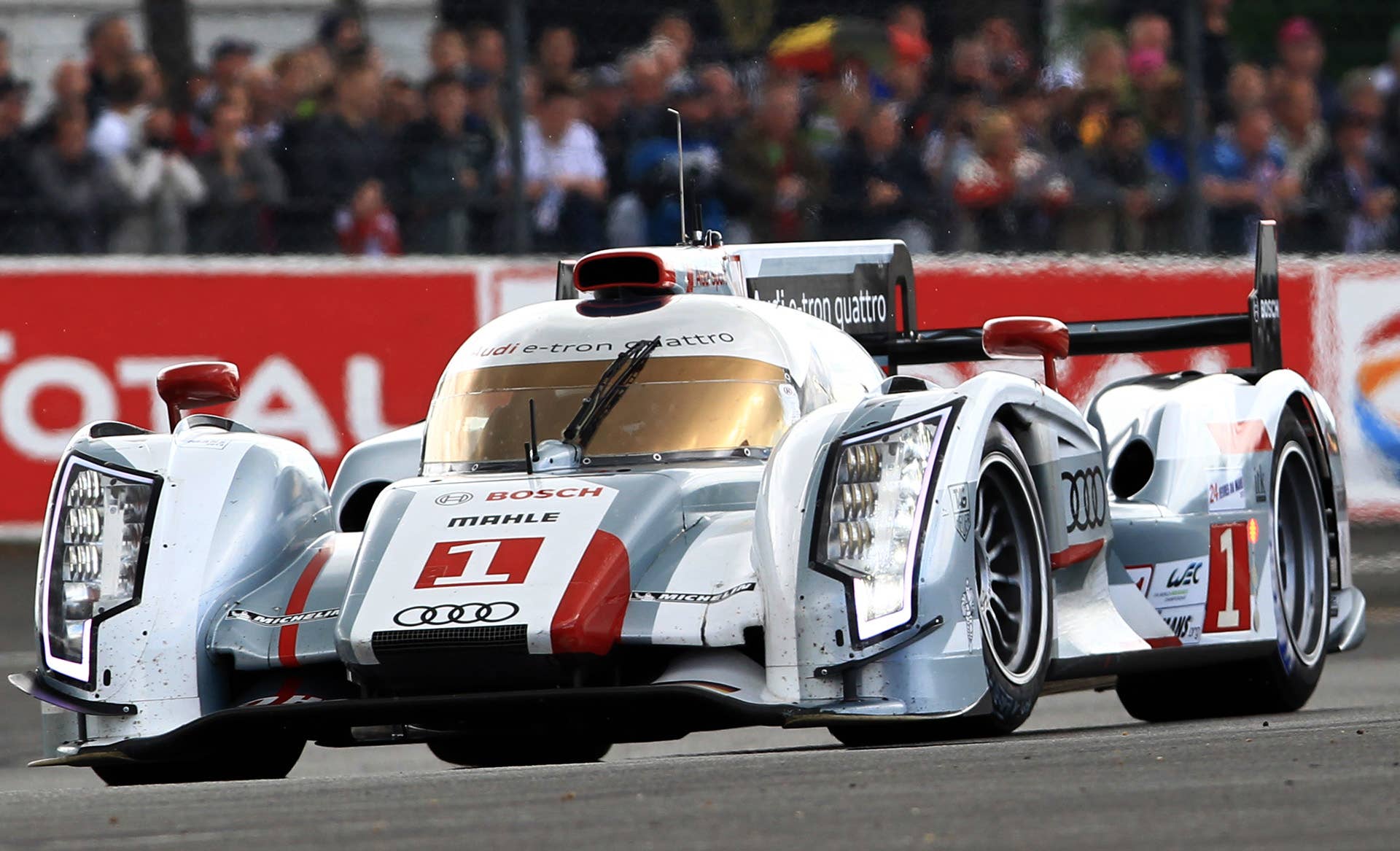 The Audi R18 TDI No1 driven by Alexander Wurz of Germany steers his car in a curve during the 80th 24-hour Le Mans endurance race, in Le Mans, western France, Saturday, June 16, 2012. (AP Photo/Bob Edme)