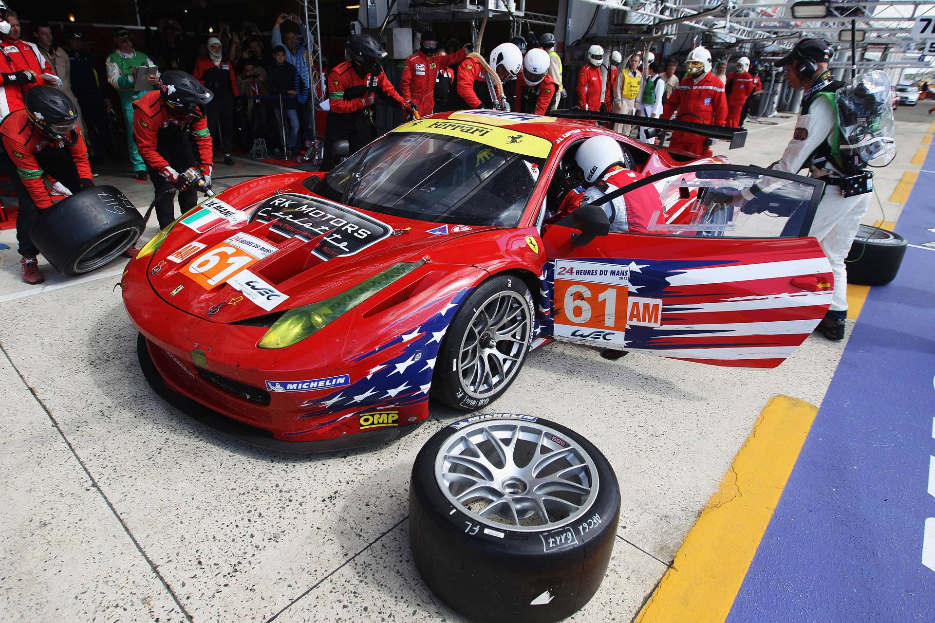 LE MANS, FRANCE - JUNE 16:  The AF - Corse Michael Waltrip Racing Ferrari 458 of Robert Kauffman, Rui Aguas and Brian Vickers in makes a pit stop during Le Mans 24 Hour race at the Circuit de la Sarthe on June 16, 2012 in Le Mans, France.  (Photo by Bryn Lennon/Getty Images)