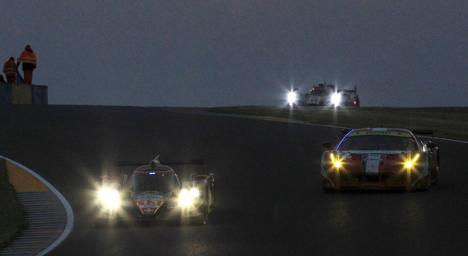 The Lola B12/60 No. 13 driven by Andrea Belicchi of Italy, Harold Primat of Swizerland and Jeroen Bleekemolen of the Netherlands is seen in action during the 80th 24-hour Le Mans endurance race, in Le Mans, western France, Sunday, June 17, 2012. (AP Photo/Bob Edme)