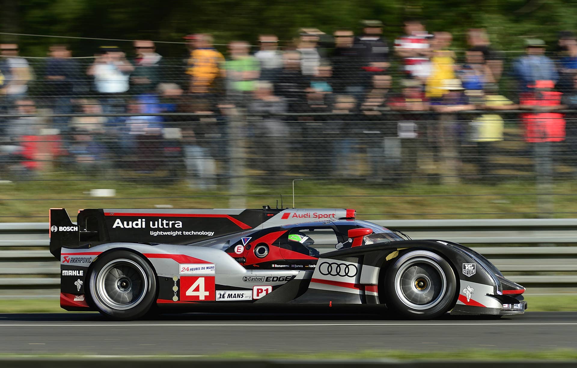 LE MANS, FRANCE - JUNE 16: Marco Bonanomi of Italy drives th #4 Audi R18 ultra during the 80th running of the Le Mans 24 Hour race at the Circuit des 24 Heures du Mans on June 16, 2012 in Le Mans, France (Photo by Rick Dole/Getty Images)