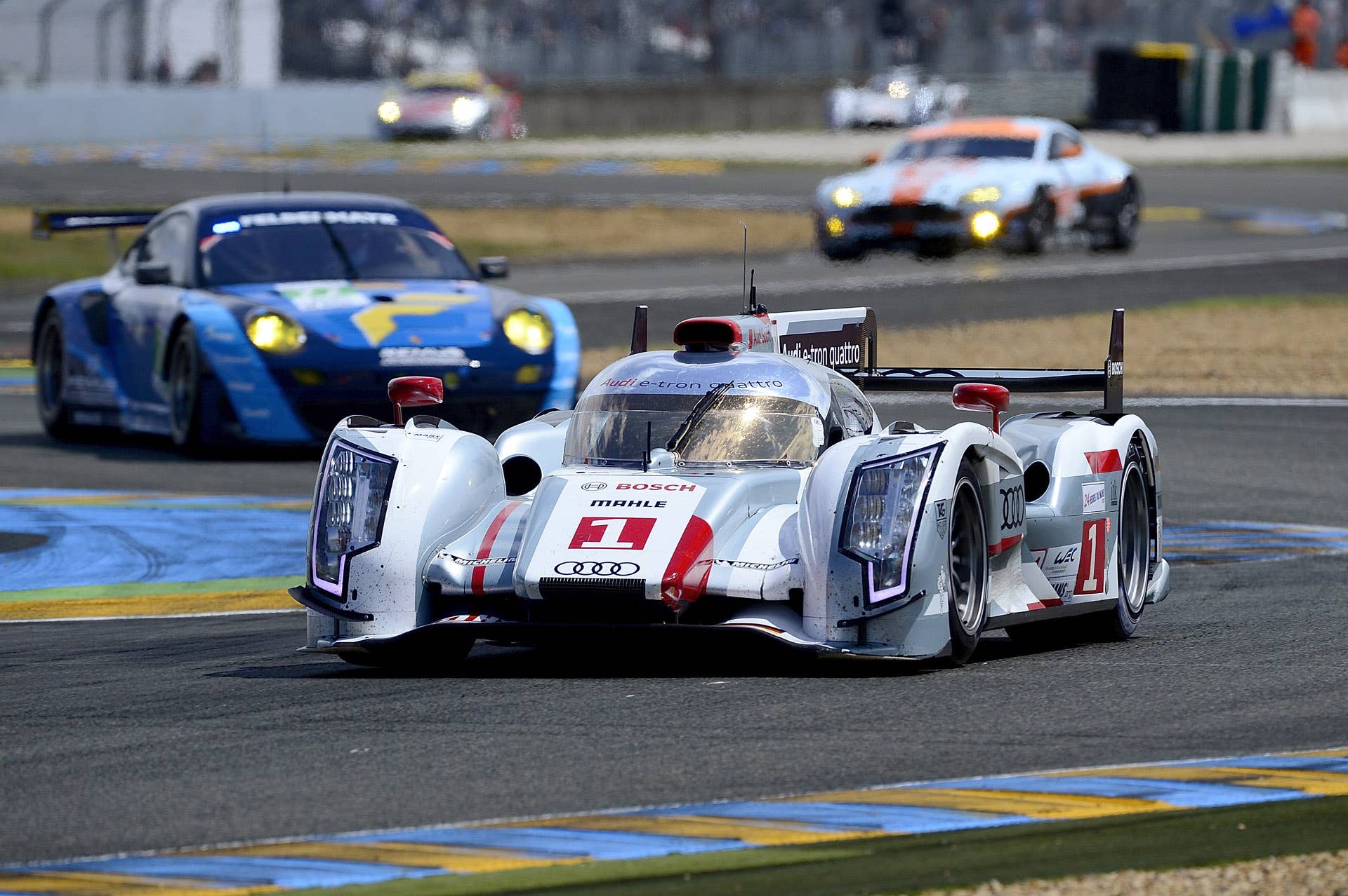 LE MANS, FRANCE - JUNE 16:  Andre Lotterer of Germany and driver of the #1 Audi R18 e-tron quattro, leads during the opening hour of the  80th running of the Le Mans 24 Hour race at the Circuit des 24 Heures du Mans  on June 16, 2012 in Le Mans, France  (Photo by Rick Dole/Getty Images)