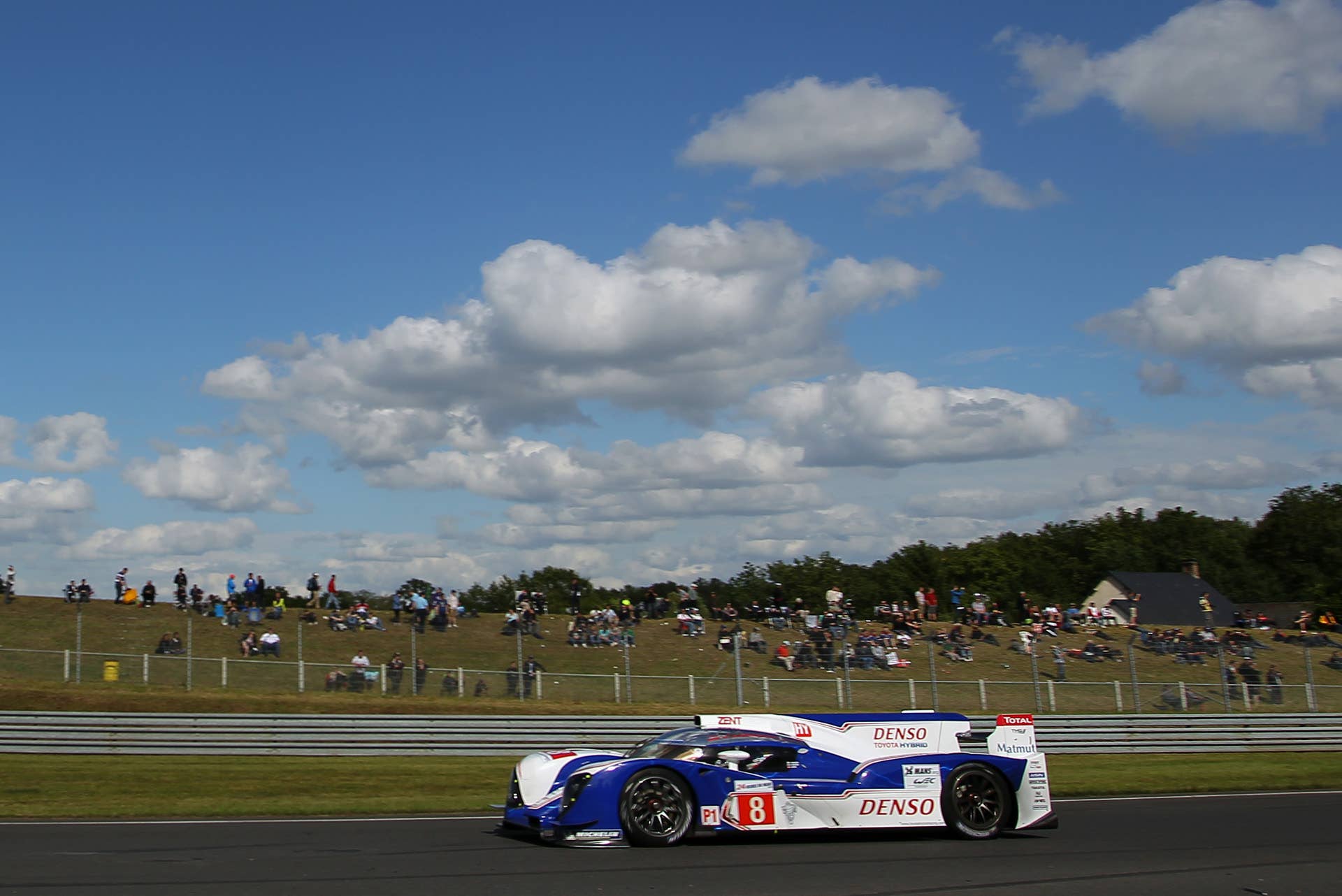 The Toyota Hybrid no8 driven by Antony Davidson of Britain is seen in action during the 80th 24-hour Le Mans endurance race, in Le Mans, western France, Saturday, June 16, 2012. (AP Photo/David Vincent)