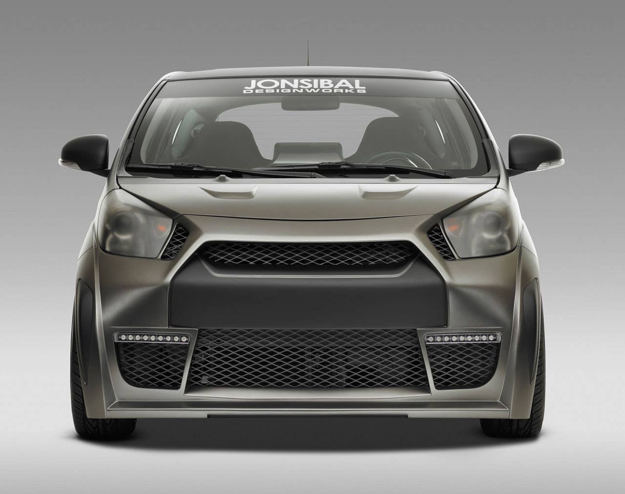 Scion iQ by Jon Sibal front