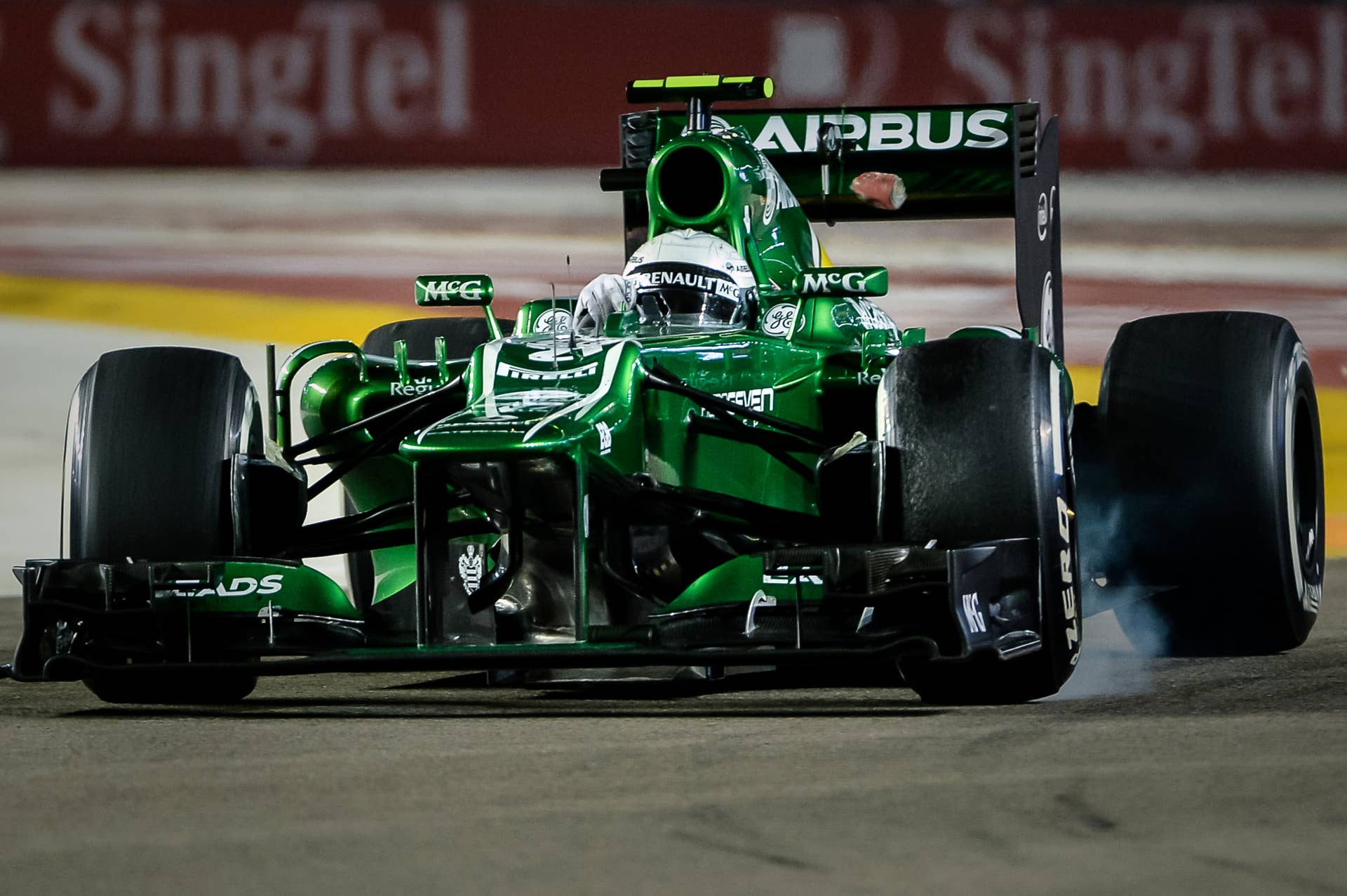 Caterham driver Giedo Van Der Garde of the Netherlands drives during the Formula One Singapore Grand Prix on September 22, 2013.   AFP PHOTO/Philippe Lopez        (Photo credit should read PHILIPPE LOPEZ/AFP/Getty Images)