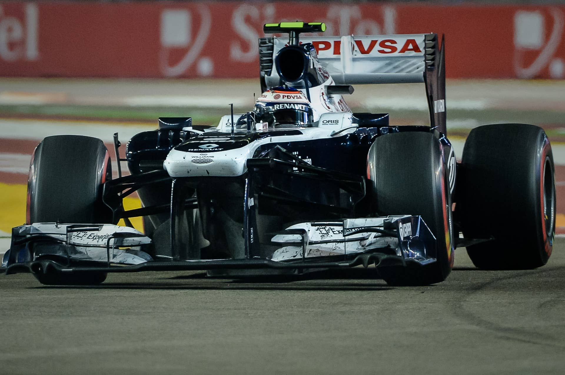 Williams driver Pastor Maldonaldo of Venezuela drives during the Formula One Singapore Grand Prix on September 22, 2013.   AFP PHOTO/Philippe Lopez        (Photo credit should read PHILIPPE LOPEZ/AFP/Getty Images)