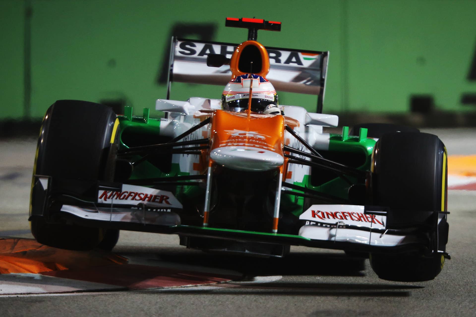 SINGAPORE - SEPTEMBER 21:  Paul di Resta of Great Britain and Force India drives during practice for the Singapore Formula One Grand Prix at the Marina Bay Street Circuit on September 21, 2012 in Singapore, Singapore.  (Photo by Mark Thompson/Getty Images)