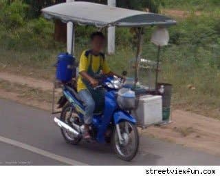This guy knows what he is doing. The roof makes sure he's not going to get wet or too hot in the sun.