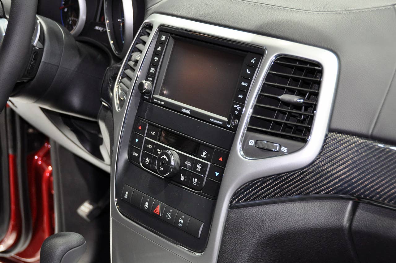 2012 Jeep Grand Cherokee SRT8 infotainment and climate controls at the 2011 New York Auto Show
