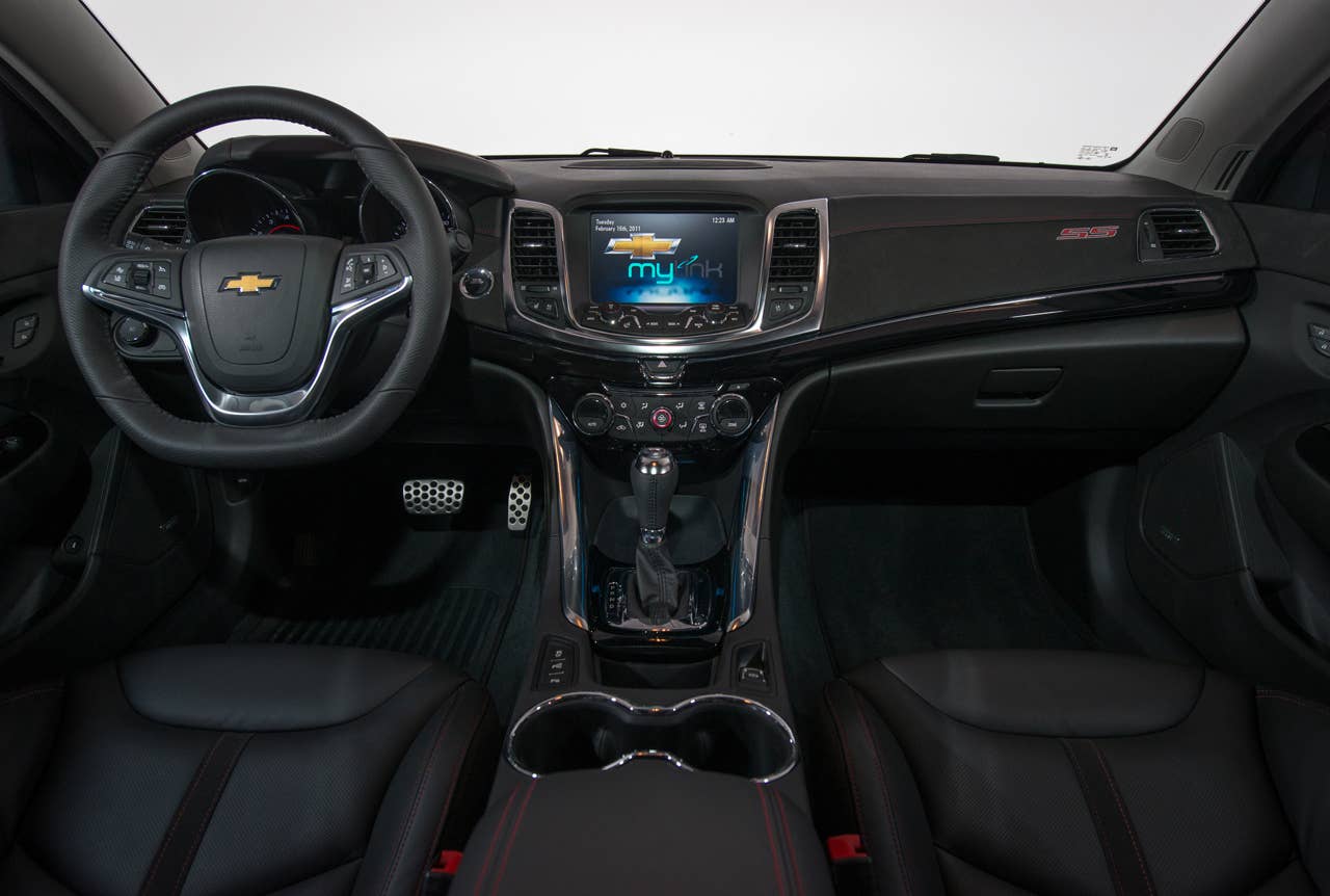 The 2014 Chevrolet SS is Chevrolet's first V-8, rear-wheel-drive performance sedan in almost 20 years. The interior of the SS comfortably accommodates five adults. Leather seats are standard, as are eight-way power adjustable front bucket seats with additional side bolstering that hug the driver and front passenger in tight-handling situations. The Chevrolet SS also features Chevrolet MyLink, push-button start, forward Collision Alert, Lane Departure Warning and Side Blind Zone Alert. (Photo by Steve Fecht for Chevrolet)