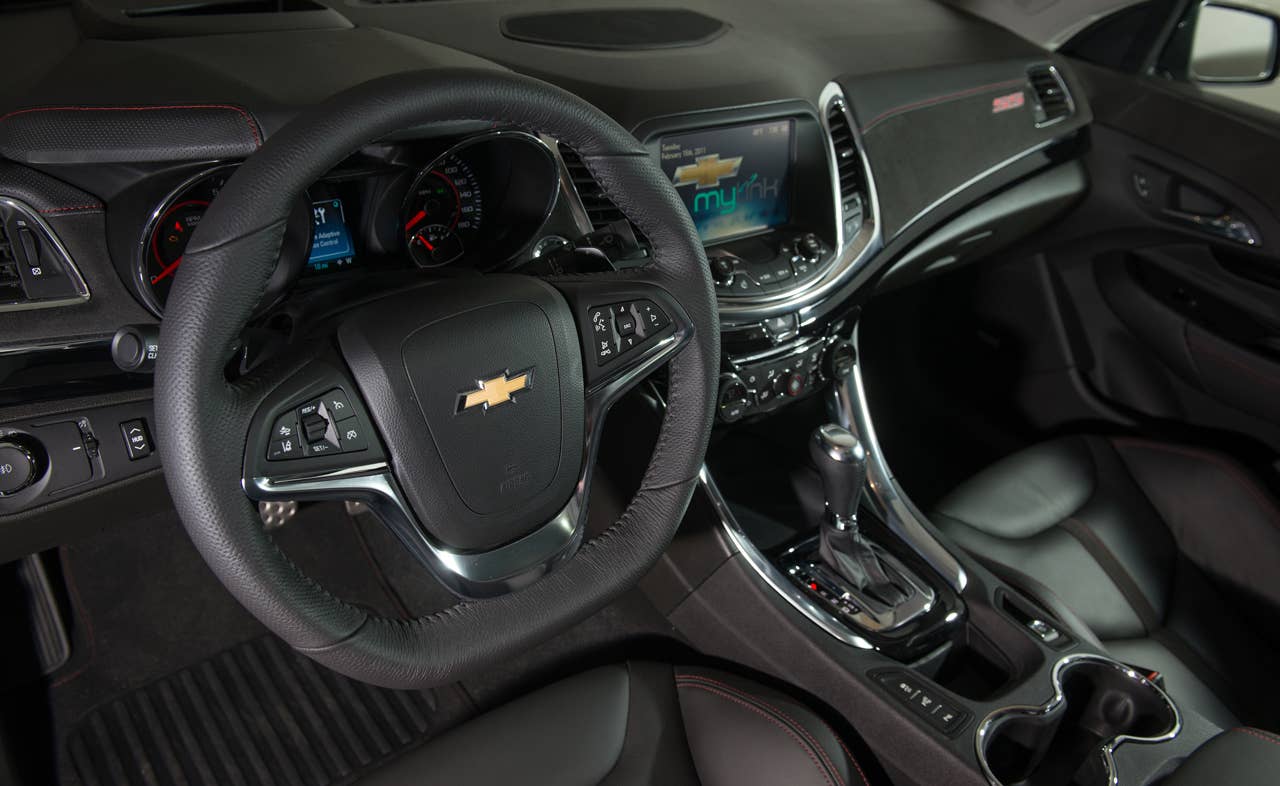 The 2014 Chevrolet SS is Chevrolet's first V-8, rear-wheel-drive performance sedan in almost 20 years. The interior of the SS comfortably accommodates five adults. Leather seats are standard, as are eight-way power adjustable front bucket seats with additional side bolstering that hug the driver and front passenger in tight-handling situations. The Chevrolet SS also features Chevrolet MyLink, push-button start, forward Collision Alert, Lane Departure Warning and Side Blind Zone Alert. (Photo by Steve Fecht for Chevrolet)