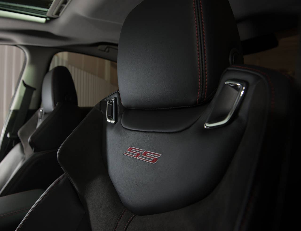 The 2014 Chevrolet SS is Chevrolet's first V-8, rear-wheel-drive performance sedan in almost 20 years. The interior of the SS comfortably accommodates five adults. Leather seats are standard, as are eight-way power adjustable front bucket seats with additional side bolstering that hug the driver and front passenger in tight-handling situations. The Chevrolet SS also features Chevrolet MyLink, push-button start, forward Collision Alert, Lane Departure Warning and Side Blind Zone Alert. (Photo by Steve Fecht for Chevrolet)