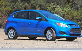 The 2013 Ford C-Max Hybrid arrives in dealerships in the early fall with a starting price of $25,995 (including shipping) making it the least expensive hybrid utility vehicle available.  Better yet, the C-Max Hybrid offers solid performance and 47 mpg in the city and 47 mpg on the highway.  Here's a look at the new C-Max Hybrid. Later this year, a plug-in hybrid model, known as the C-Max Energi.