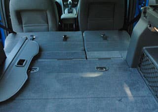 Much of the utility of the C-Max Hybrid comes from the easy to fold second row.  While the space behind the second row is more than 20 cubic feet, when the seats are folded, there is more than 52 cubic feet.
