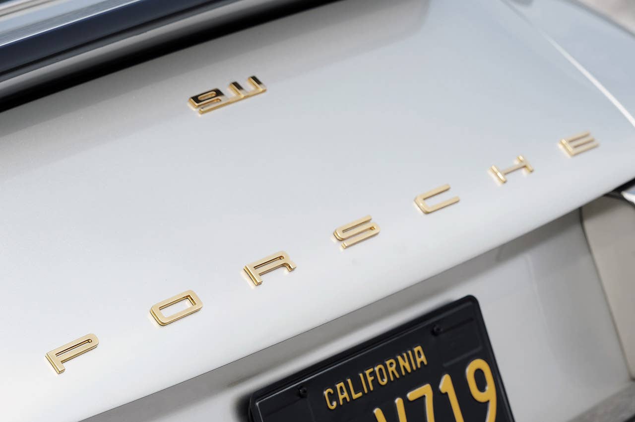 Porsche 911 Restored by Singer badges