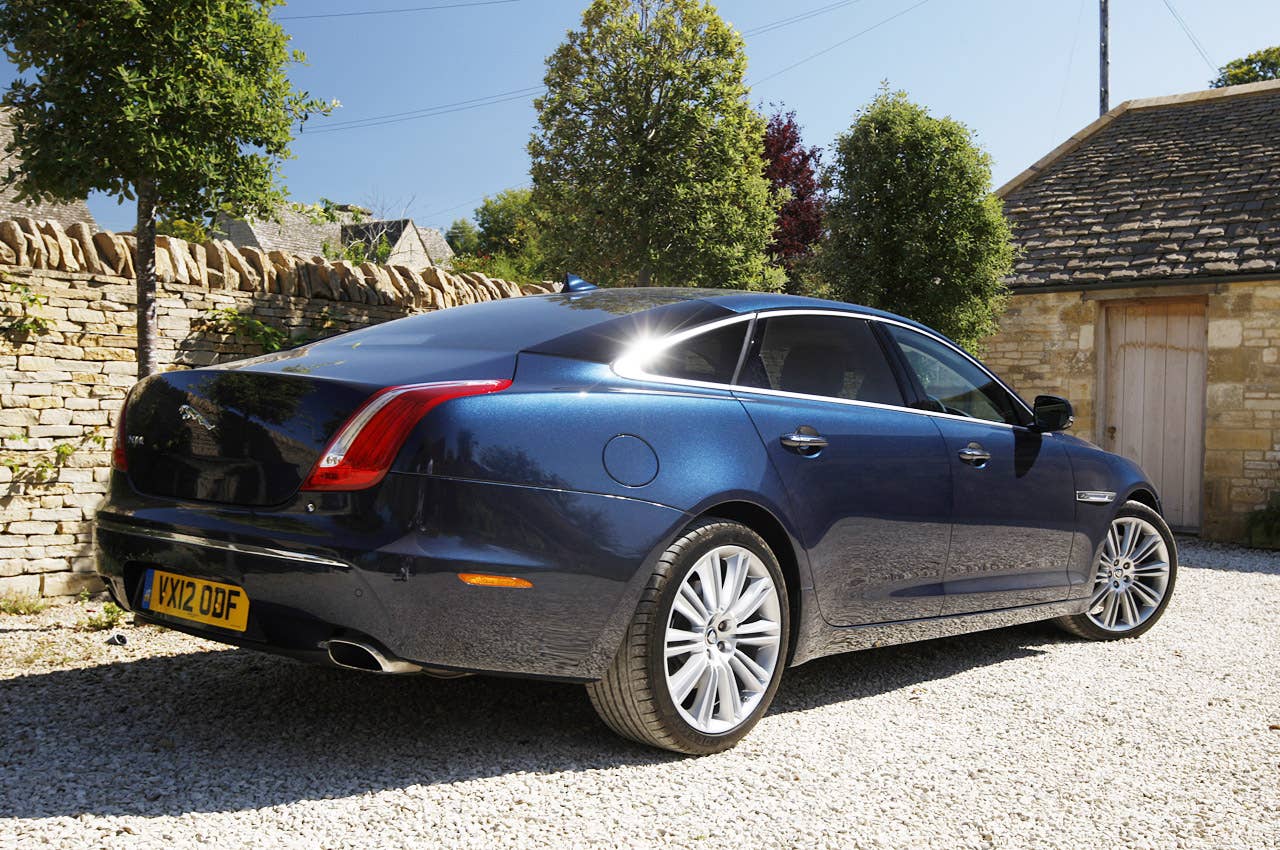 2013 Jaguar XJ V6 rear 3/4 view