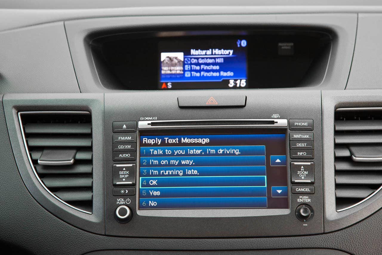 2012 Honda CR-V EX-L AWD interior with Honda Satellite-Linked Navigation system (SMS text messaging function shown)