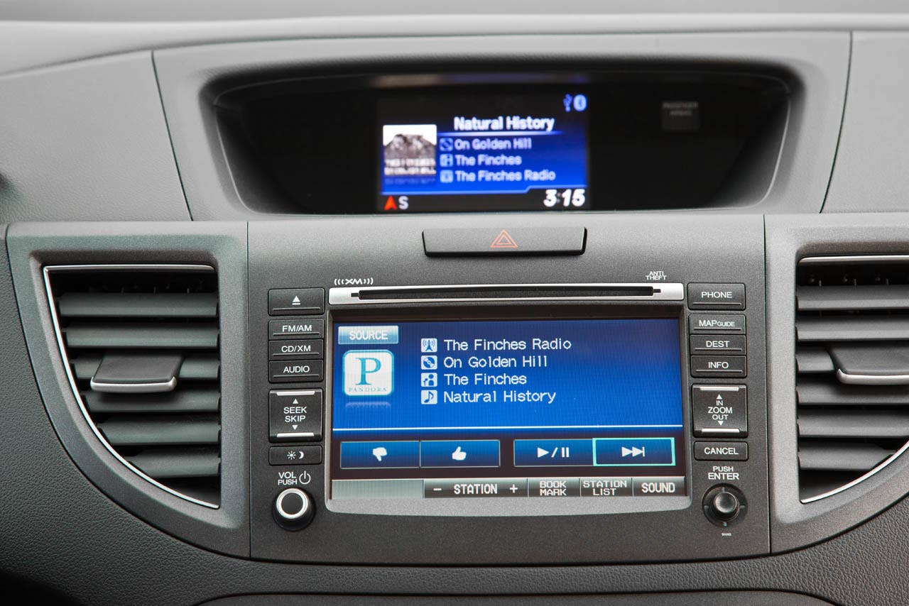 2012 Honda CR-V EX-L AWD interior with Honda Satellite-Linked Navigation system (Pandora internet radio interface shown)