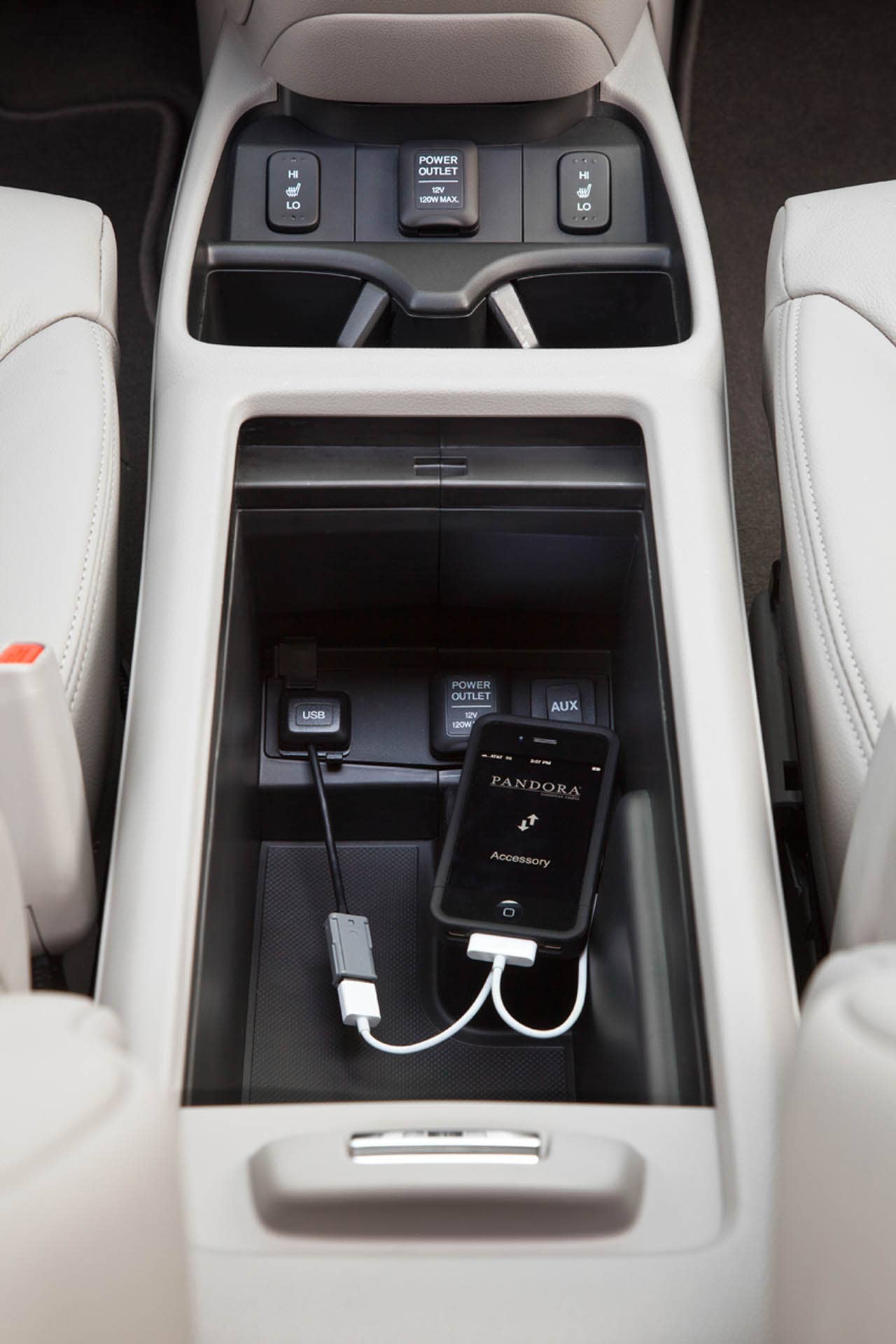 2012 Honda CR-V EX-L AWD interior center console with USB audio interface shown (iPhone not included)