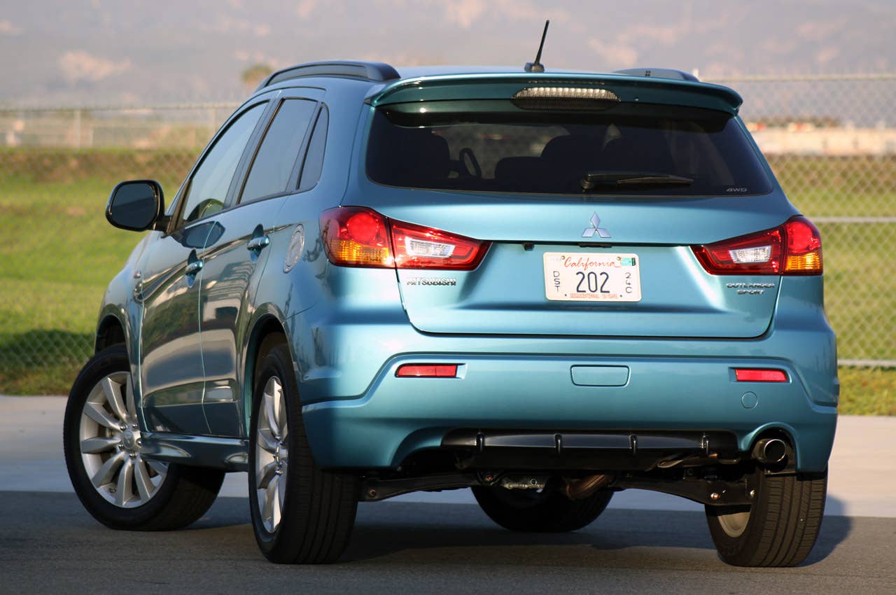 2011 Mitsubishi Outlander Sport SE AWC rear 3/4 view