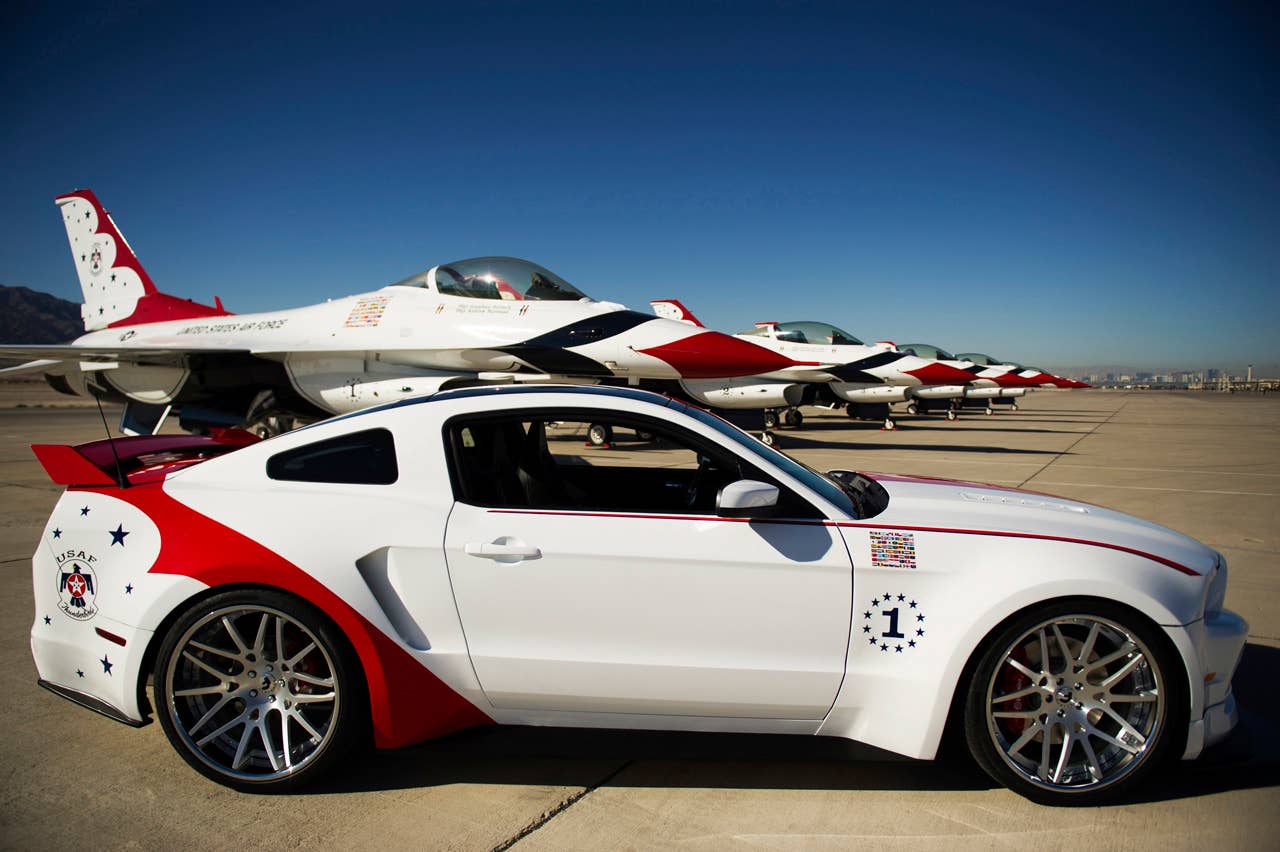The engineering and design teams at Ford Motor Company have produced a unique U.S. Air Force Thunderbirds Edition 2014 Ford Mustang GT. This car will be donated by Ford to be sold at the Gathering of Eagles charity event on Thursday, Aug. 1 during the Experimental Aircraft Association (EAA) AirVenture Oshkosh 2013 - the World's Greatest Aviation Celebration. (07/01/2013)