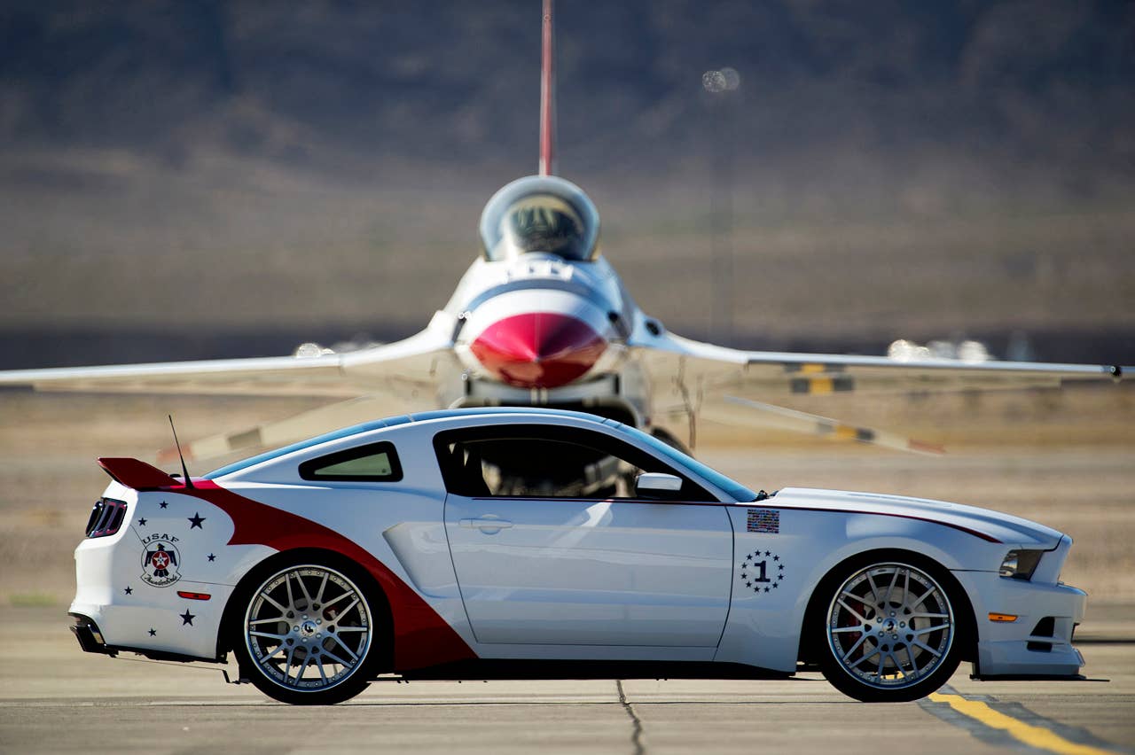 The engineering and design teams at Ford Motor Company have produced a unique U.S. Air Force Thunderbirds Edition 2014 Ford Mustang GT. This car will be donated by Ford to be sold at the Gathering of Eagles charity event on Thursday, Aug. 1 during the Experimental Aircraft Association (EAA) AirVenture Oshkosh 2013 - the World's Greatest Aviation Celebration. (07/01/2013)