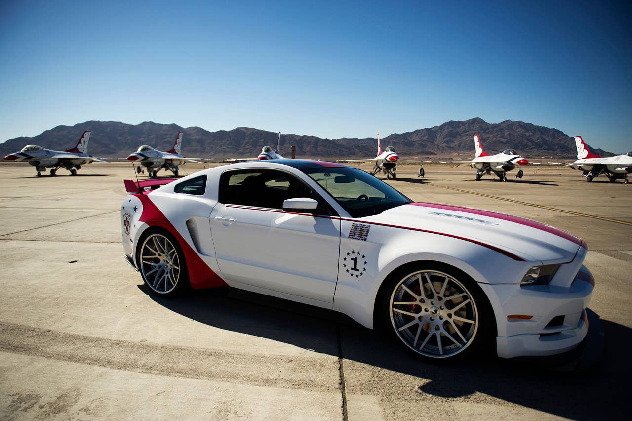The engineering and design teams at Ford Motor Company have produced a unique U.S. Air Force Thunderbirds Edition 2014 Ford Mustang GT. This car will be donated by Ford to be sold at the Gathering of Eagles charity event on Thursday, Aug. 1 during the Experimental Aircraft Association (EAA) AirVenture Oshkosh 2013 - the World's Greatest Aviation Celebration. (07/01/2013)