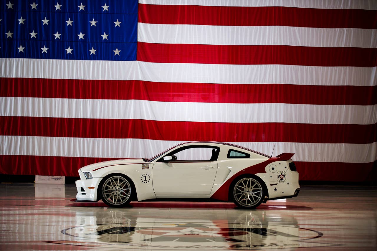 The engineering and design teams at Ford Motor Company have produced a unique U.S. Air Force Thunderbirds Edition 2014 Ford Mustang GT. This car will be donated by Ford to be sold at the Gathering of Eagles charity event on Thursday, Aug. 1 during the Experimental Aircraft Association (EAA) AirVenture Oshkosh 2013 - the World's Greatest Aviation Celebration. (07/01/2013)