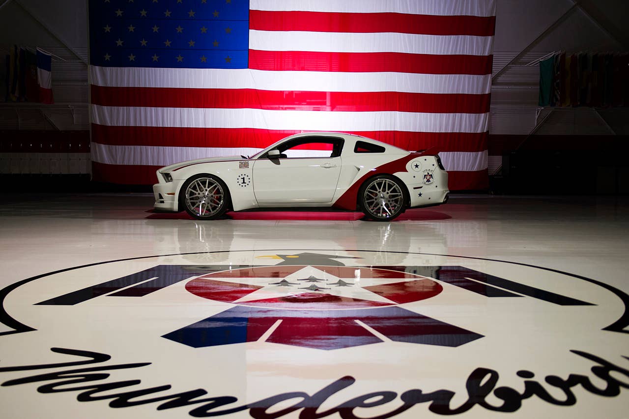 The engineering and design teams at Ford Motor Company have produced a unique U.S. Air Force Thunderbirds Edition 2014 Ford Mustang GT. This car will be donated by Ford to be sold at the Gathering of Eagles charity event on Thursday, Aug. 1 during the Experimental Aircraft Association (EAA) AirVenture Oshkosh 2013 - the World's Greatest Aviation Celebration. (07/01/2013)