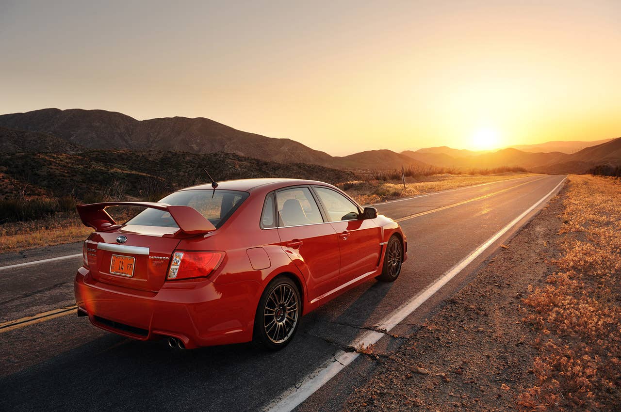 2011 Subaru Impreza WRX STI rear 3/4 view