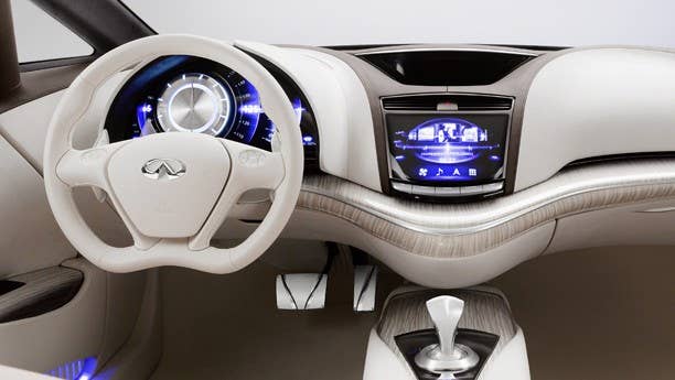 Infiniti has been putting out some seriously innovative concepts, and while the Etherea's exterior might be too revolutionary for the masses (for now), the interior is as elegant as it gets. Since it's a front-wheel-drive platform, Infinti's designers opted to flatten the floor to promote a feeling of openness, accentuated by the light colors and soft materials. In front of the driver is a beautiful IP, with an aluminum, offset tachometer partnered with four semi-circular dials for speed, gear, range and fuel. Infinti fitted two displays to the Etherea – one touchscreen mounted at the bottom of the dash and another closer to the windshield that provides glanceable information to the driver. It's a smart separation and something we're likely to see on future Infinitis.