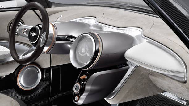 Mini is getting back to its minimalistic roots with the Rocketman concept, a compact hatch that's likely to form the next major addition to the Mini family. The interior is easily the most sparse cockpit we saw in Geneva, with only a 3D globe in the center displaying powertrain and entertainment options. Mini is currently using a glorified joystick to control its infotainment system, but the Rocketman employs a new steering wheel-mounted trackball and confirmation button that ensures the driver's hands never leave the wheel.