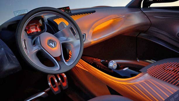 Something you won't be seeing anytime soon is an interior fitted with a curved, translucent dash and elastic ropes, but that's not stopping Renault's designers from making it happen on the Captur concept. The idea behind the interior is to create a warm, soothing environment for passengers, and to that end, Renault has created a set of seats made of a new kind of elastic composite– think of it as a Spock-approved hammock and you're not far off. Other features include a TFT screen mounted front and center and a heads up display that acts as a secondary screen for the driver.