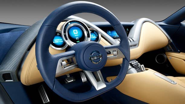 Nissan is out to prove that Tesla isn't the only automaker that can make a sporting EV, and the Esflow concept is likely to form the basis of the automaker's first fully-electric sports car. The interior is a graceful combination of colors and shapes (we're particularly impressed with the two arches of carbon fiber coating the dash), with seats that are built directly into the rear bulkhead to stiffen the chassis. Naturally, this means the seats are immobile, but the steering wheel, pedals and gauges all telescope inward to fit the driver. Four LCD screens– three in front of the driver and one in the center console – provide all the pertinent information, while a small grouping of toggle switches on the central tunnel handle HVAC duties and a small joystick engages the transmission.
